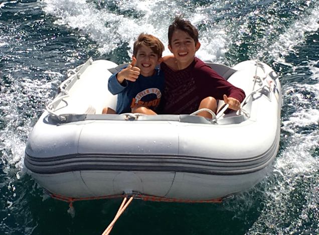 Thiago and Lucas enjoying a bit of speed behind the yacht